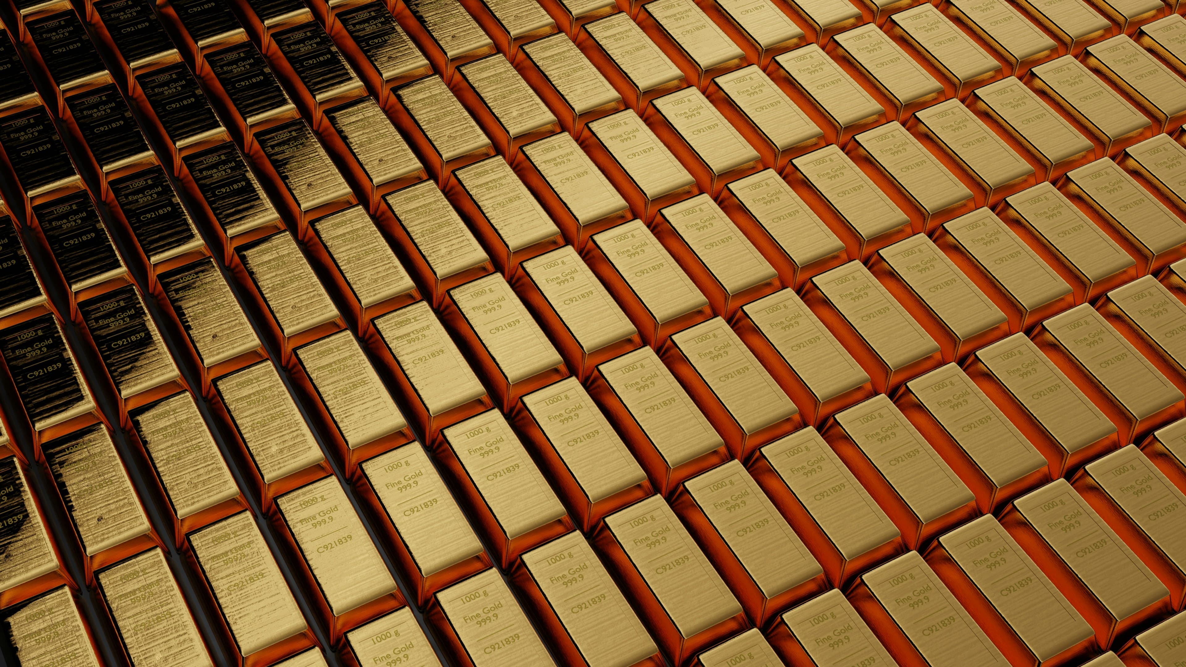 Reihen von Goldbarren als Anlagegold
